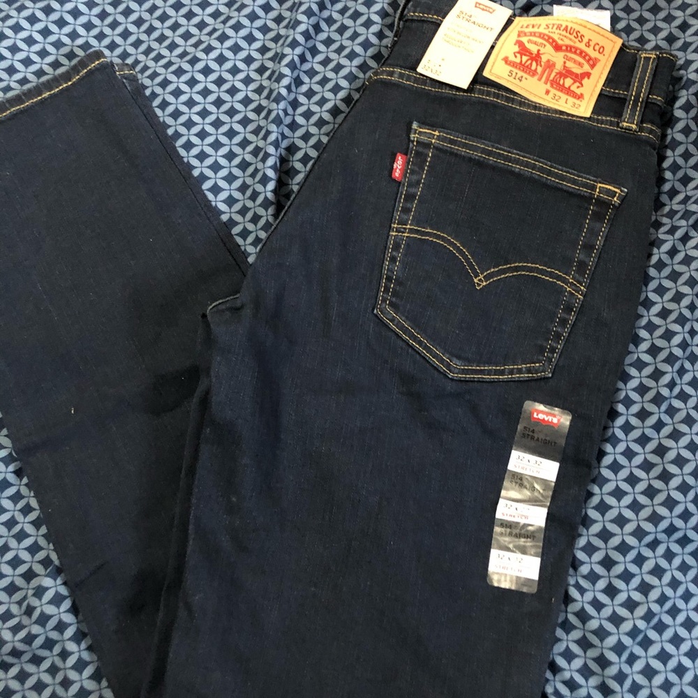 Brand new, with tags. Blue jeans